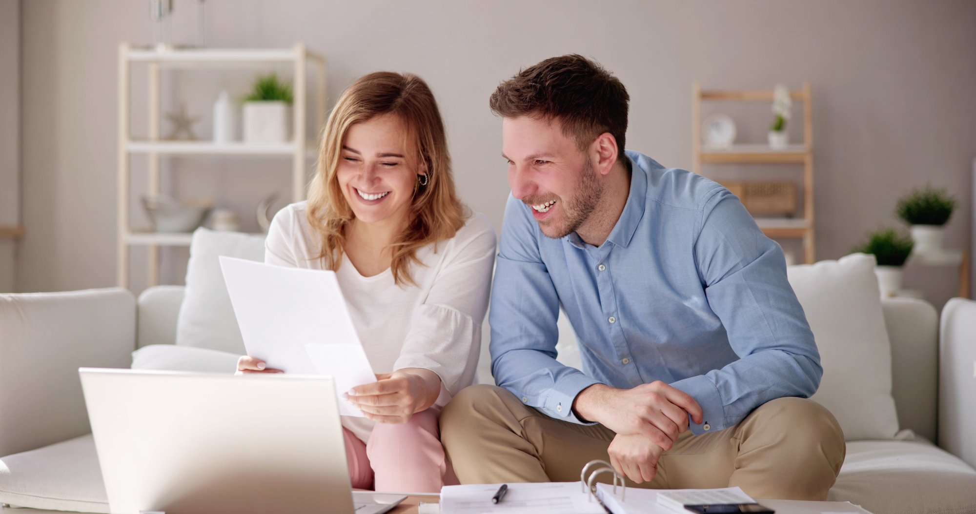 two-parents-looking-at-paper